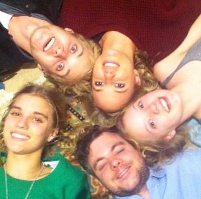 A picture of Debbie's kids with their half-siblings.